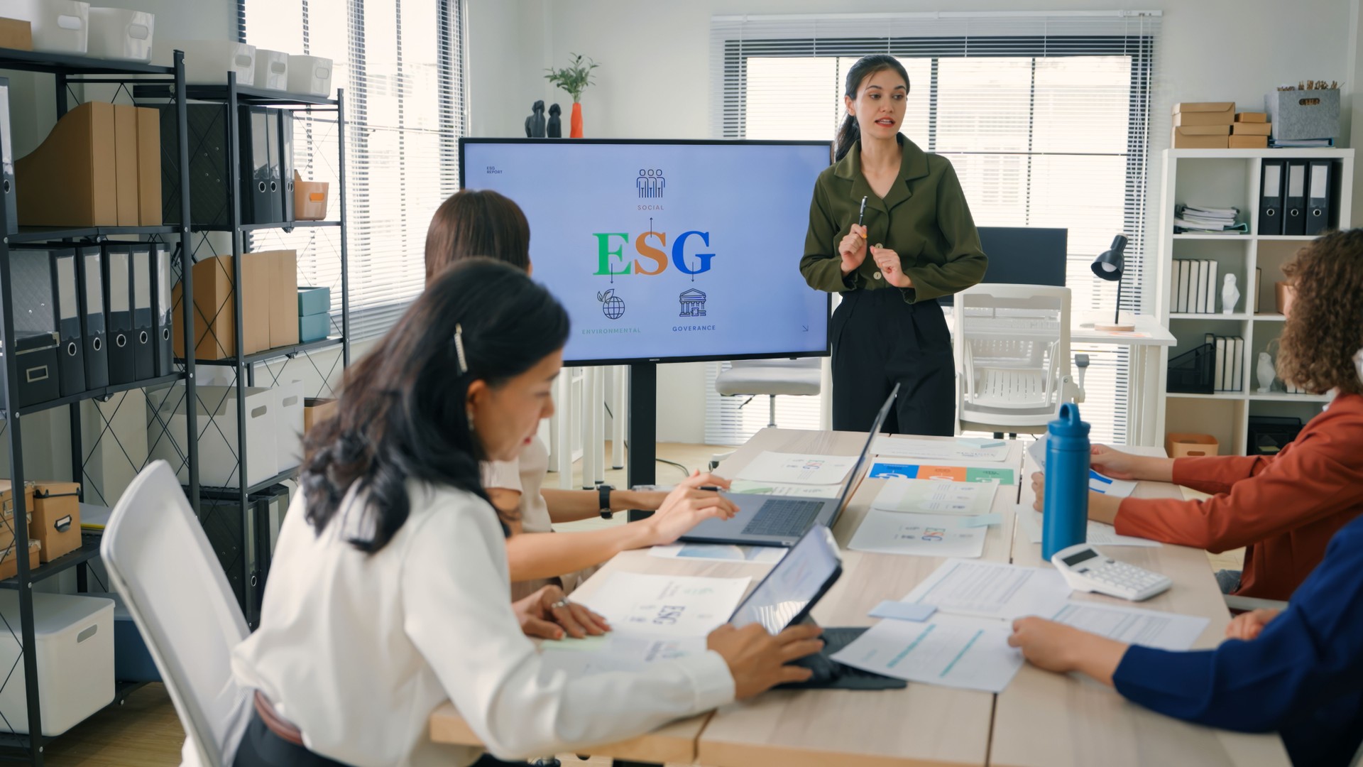 ESG Presentation in Modern Workspace. Group of female Business meeting in the office